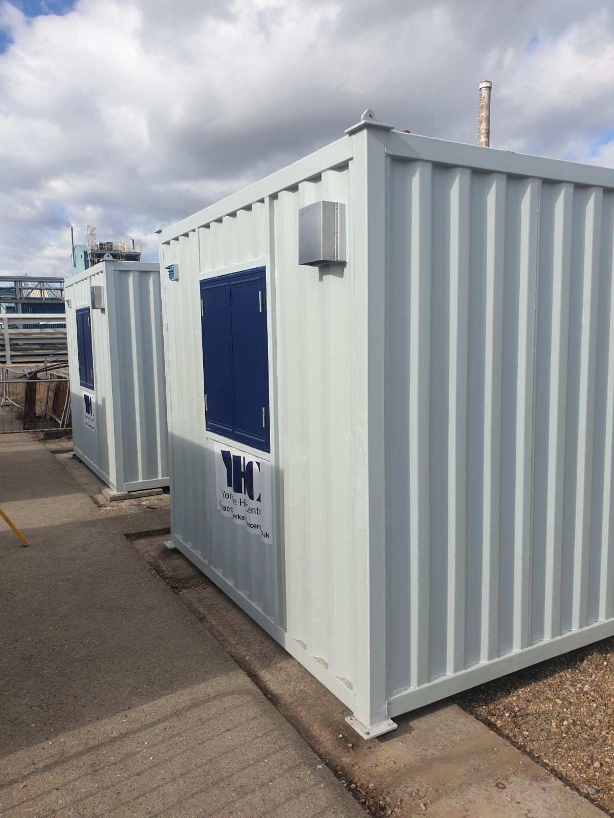 Two steel cabins side by side.